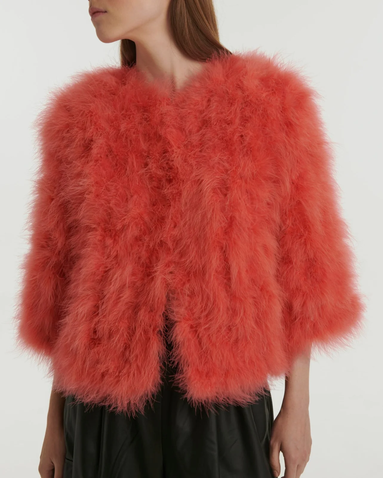 Veste courte en plumes
